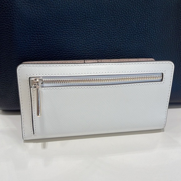 Kate Spade Madison Large Slim Bifold Wallet
Meringue 
NWT - Picture 11 of 16